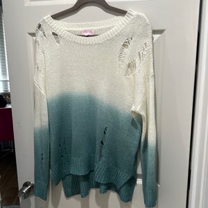 Brand new light weight sweater from pink Lily.